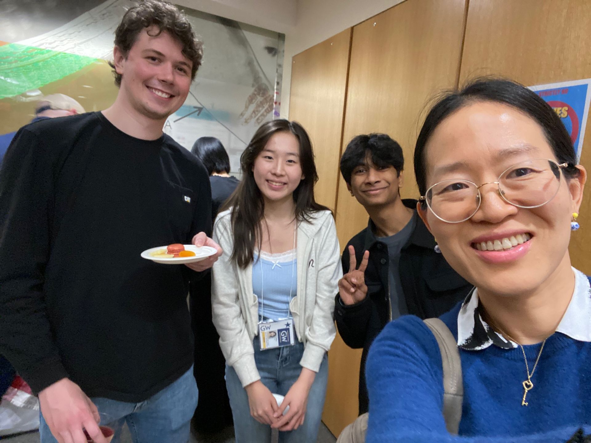 Dr. Chung, Rita, Raghav, and Nate at the Department holiday party